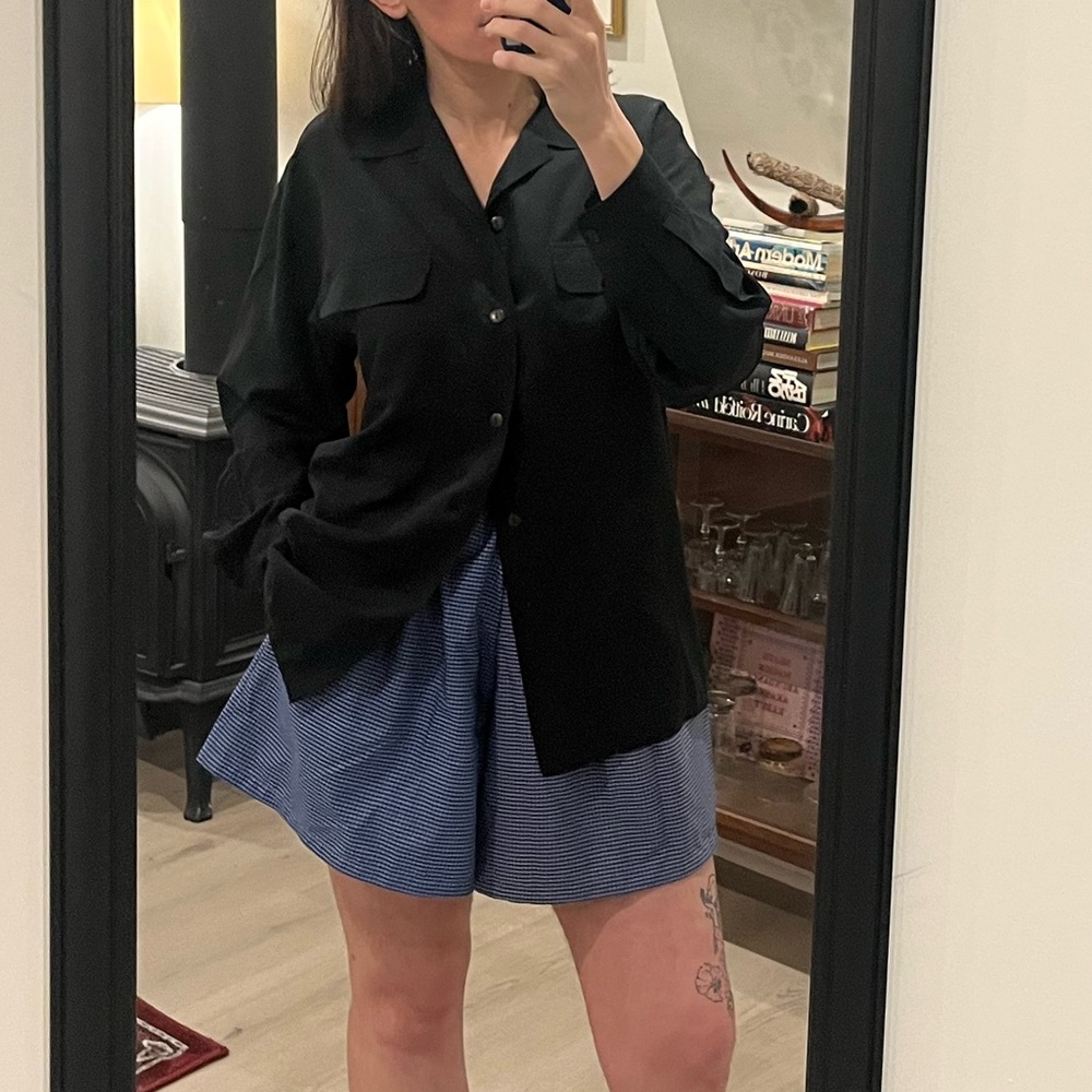 Black Button-Up Shirt and Blue Shorts